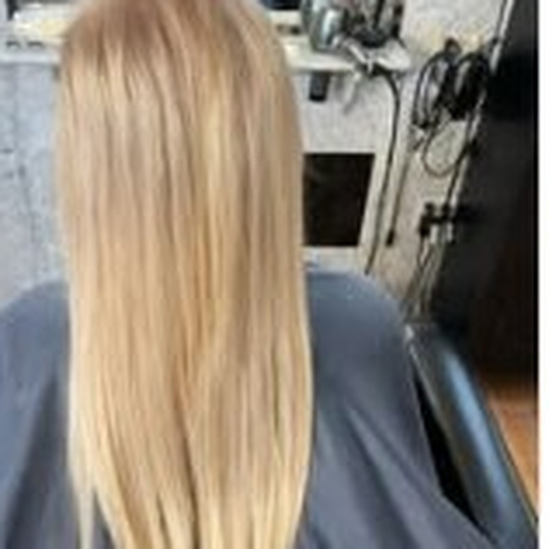 Bright blonde color result, back view